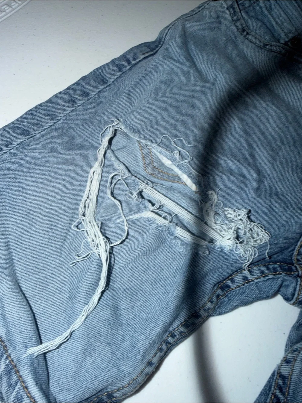 Levi's Light Blue Distressed Denim Shorts